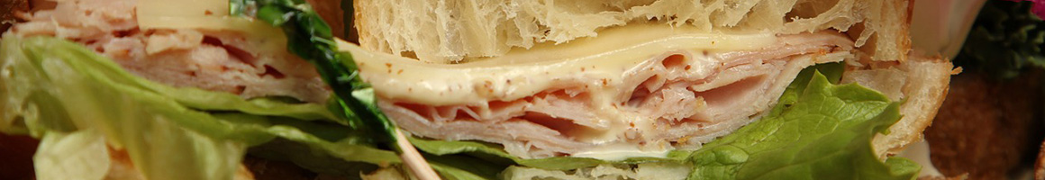 Eating Sandwich Cafe Bakery at Honey Bear Bakery restaurant in Lake Forest Park, WA.